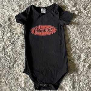 Peterbilt short sleeve black onesie. 18 months. Great condition, worn twice.